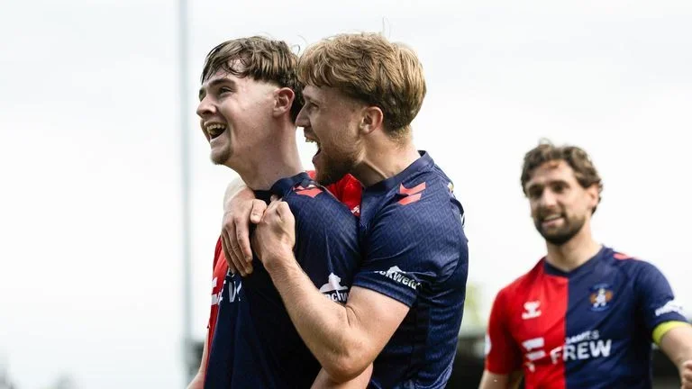 Kilmarnock's Findlay Curtis (L) celebrates scoring to make it 3-0 against St Mirren
